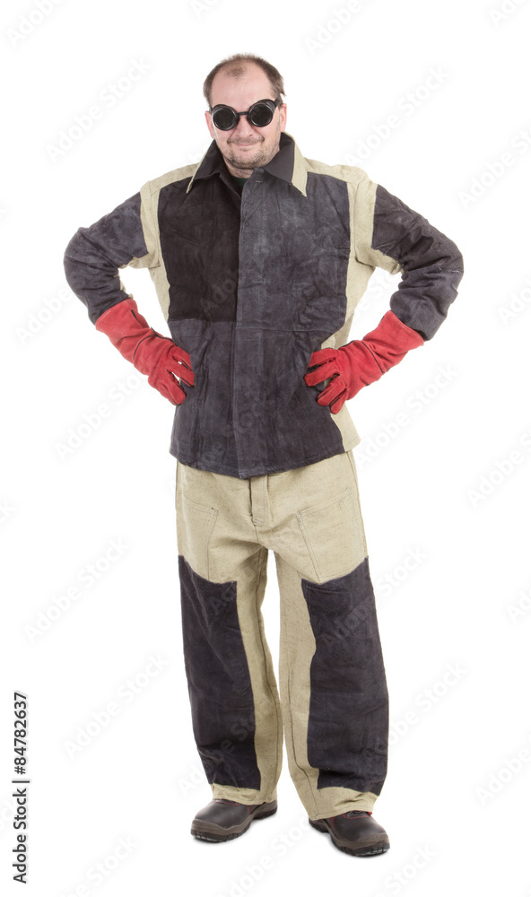Smiling worker with arms on waist. Smiling worker with arms on waist.