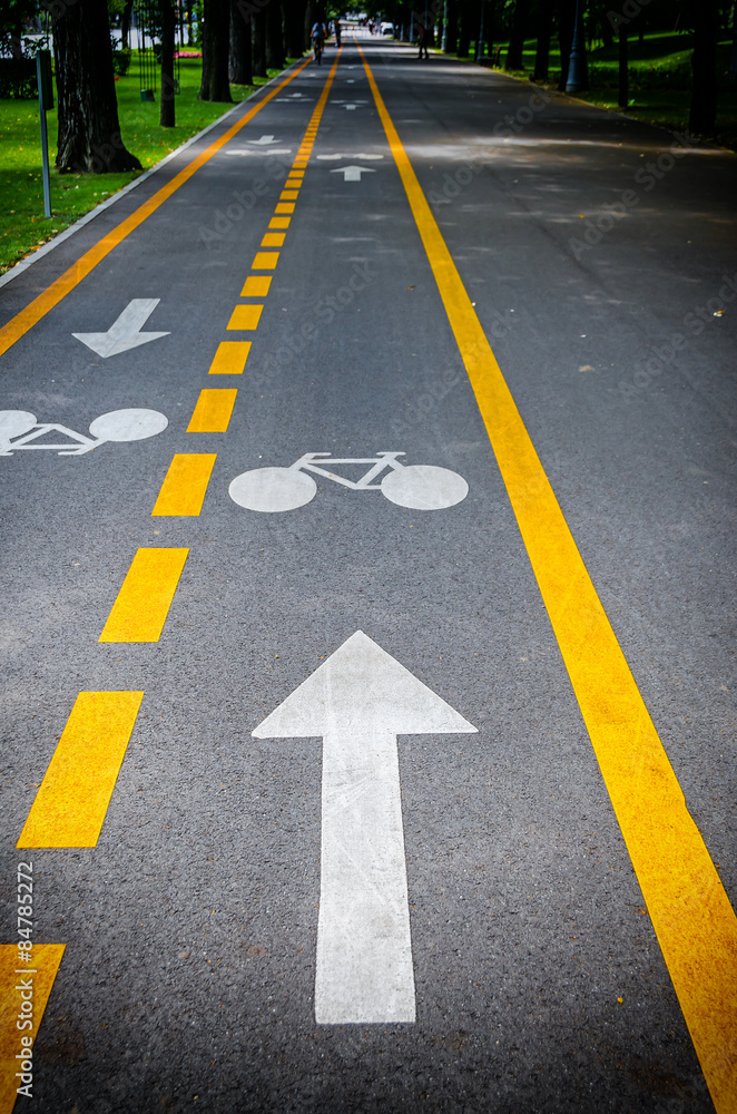 Arrow pointing a bike on a bicycle track Arrow pointing a bike on a bicycle track