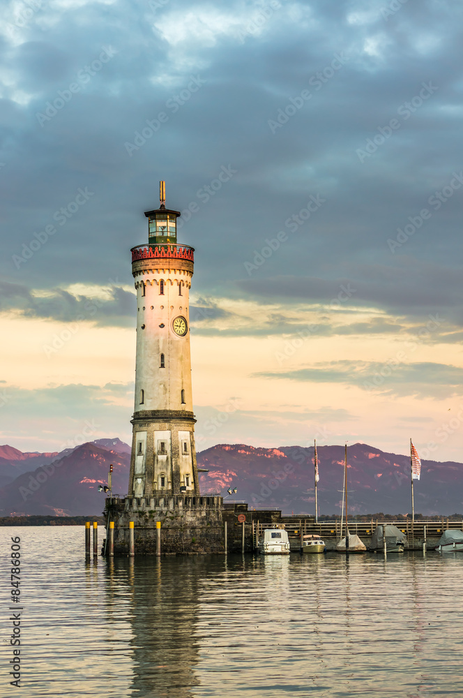 Beautiful evening seascape with lighthouse in harbor of Lindau