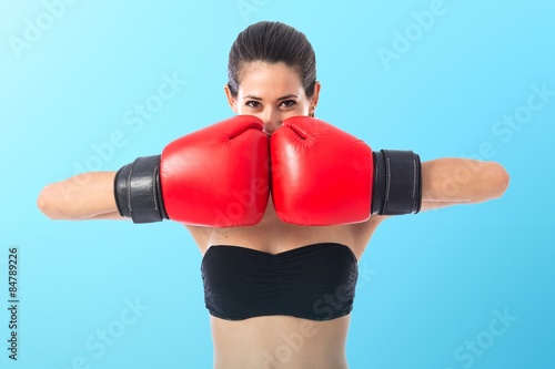 Sport woman with boxing gloves © luismolinero