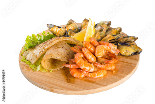 Shrimps, mussels, fish with lemon
