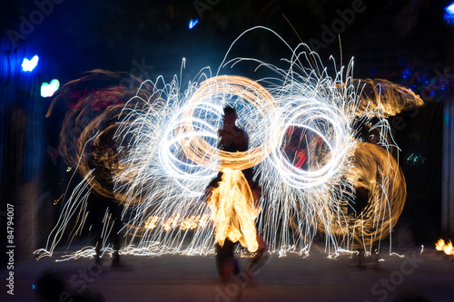 Fire performance. Motion blurred photo