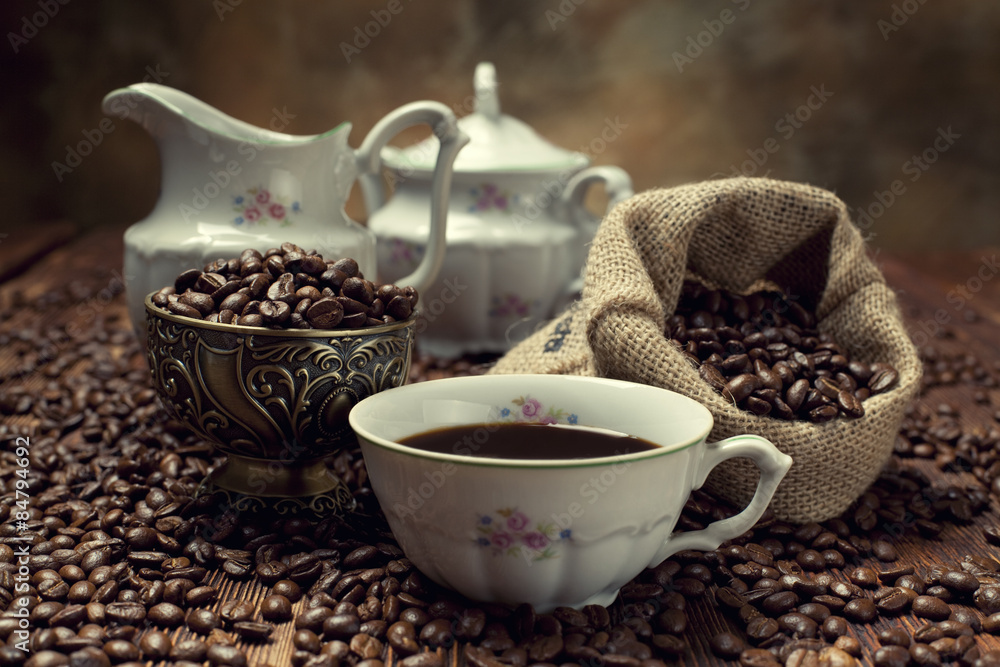 Coffee cup, beans and canvas sack Coffee cup, beans and canvas sack
