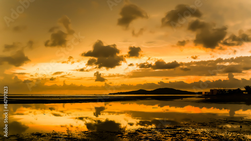 atmosphere at sunrise on the beach