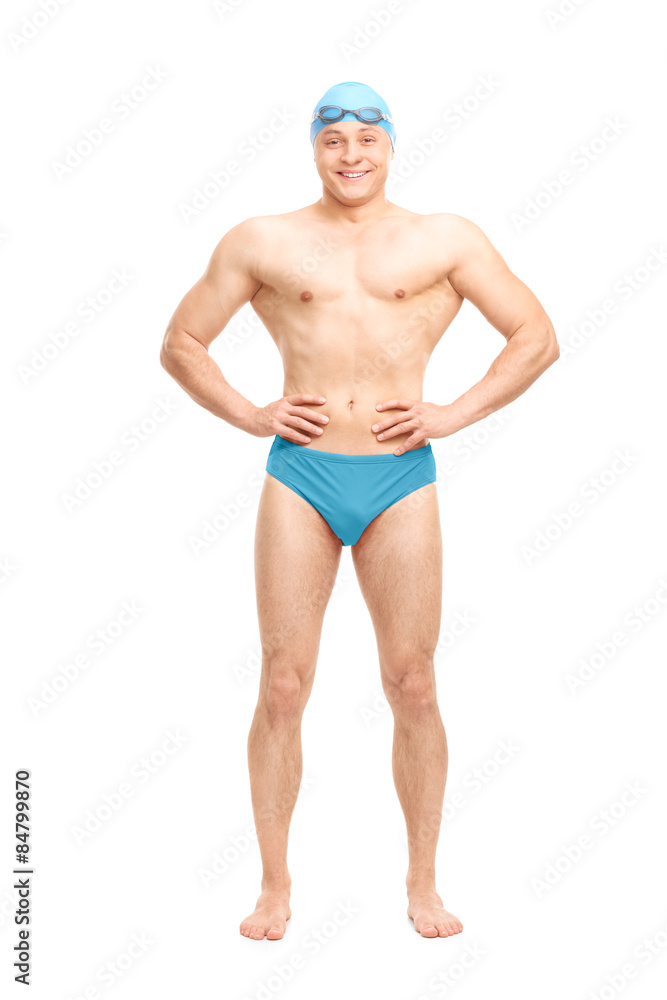 Muscular swimmer with a swim cap and goggles Muscular swimmer with a swim cap and goggles