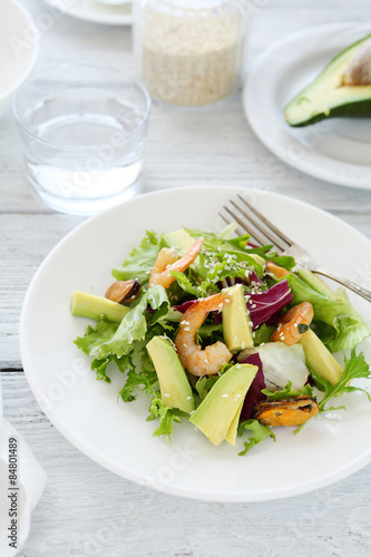 Delicious salad with shrimp and avocado