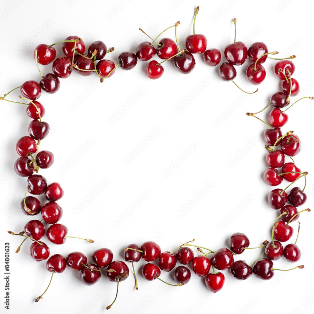 Red cherries on a white background