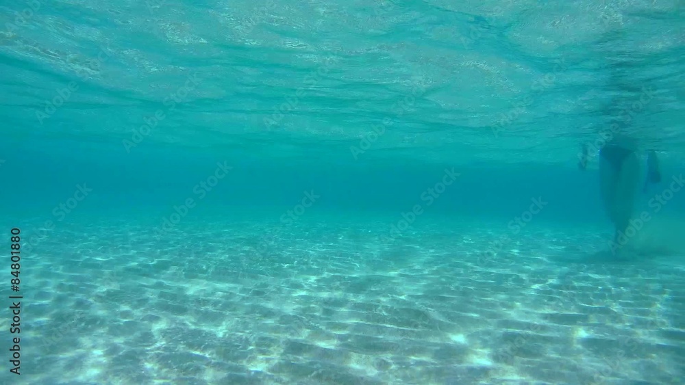 A man walks along the sandy bottom, Red sea, Marsa Alam, A man walks along the sandy bottom, Red sea, Marsa Alam,