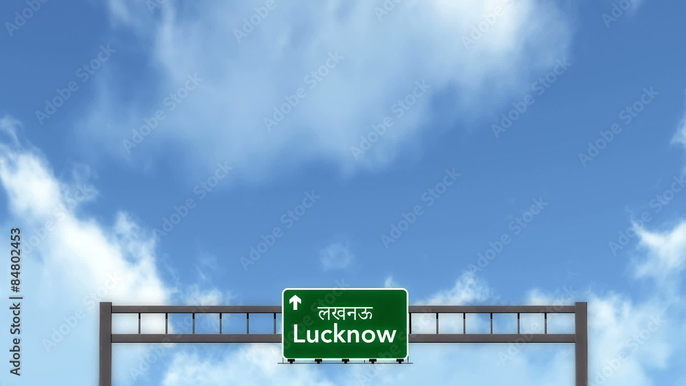 Passing under Lucknow India Highway Road Sign
  