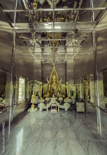 Canvas Print Buddha statue in stainless steel temple