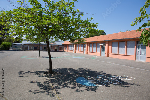 Red School  Building under a  blue sky photo