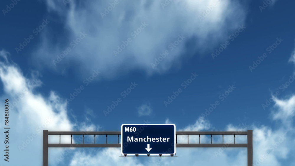 Passing under Manchester United Kingdom Highway Road Sign at Night
Passing under Manchester United Kingdom Highway Road Sign at Night