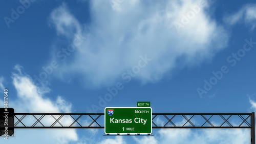 Passing under Kansas City USA Interstate Highway Road Sign
  