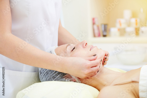 doctor doing facial massage