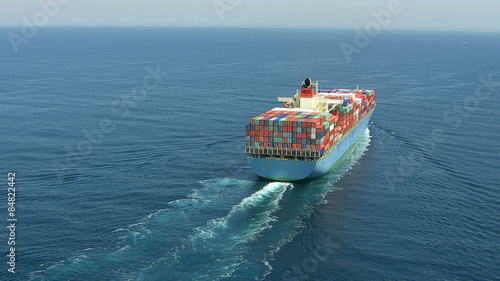 Aerial shot of container ship in ocean