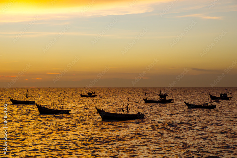 Stock Photo - Scenic View of Boat Floating in The Sea while Suns