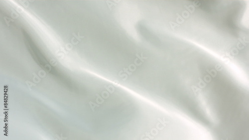 White silk fabric blowing in the wind, abstract background photo
