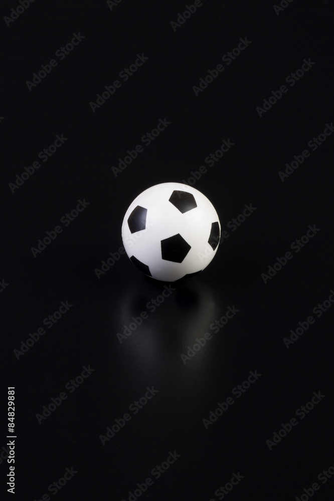 soccer ball on a black background