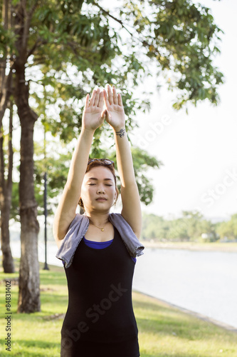Asian woman exercising outdoors