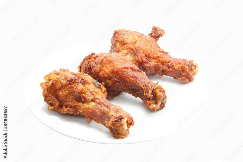 Chicken leg fried on white background Chicken leg fried on white background