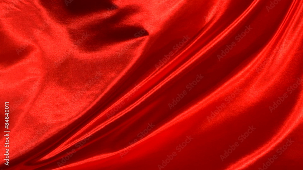 Red silk fabric blowing in the wind