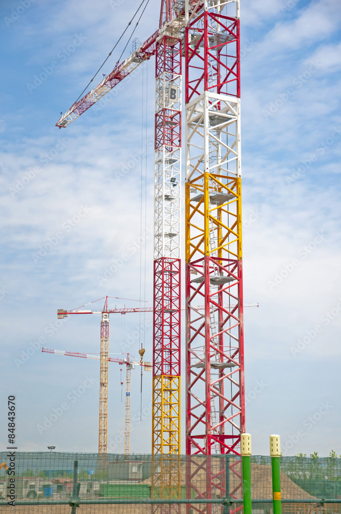 construction cranes in the blue sky in panorama picture construction cranes in the blue sky in panorama picture