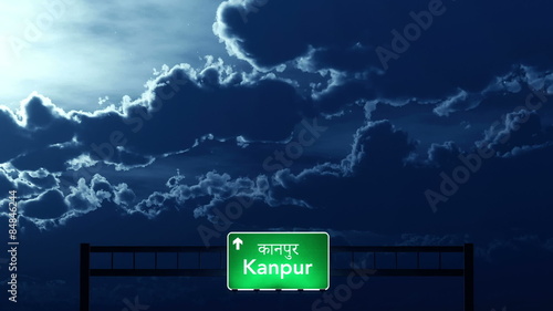 Passing under Kanpur India Highway Road Sign at Night
  