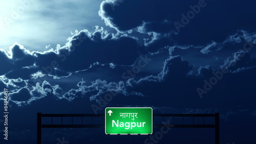 Passing under Nagpur India Highway Road Sign at Night
   photo