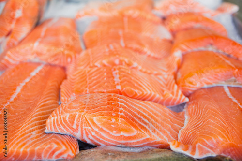 Fresh salmon fish on ice in market
