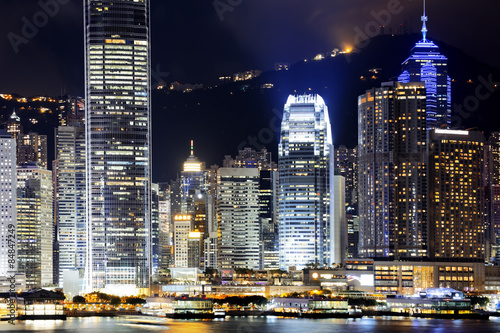 hong kong office buildings at night photo