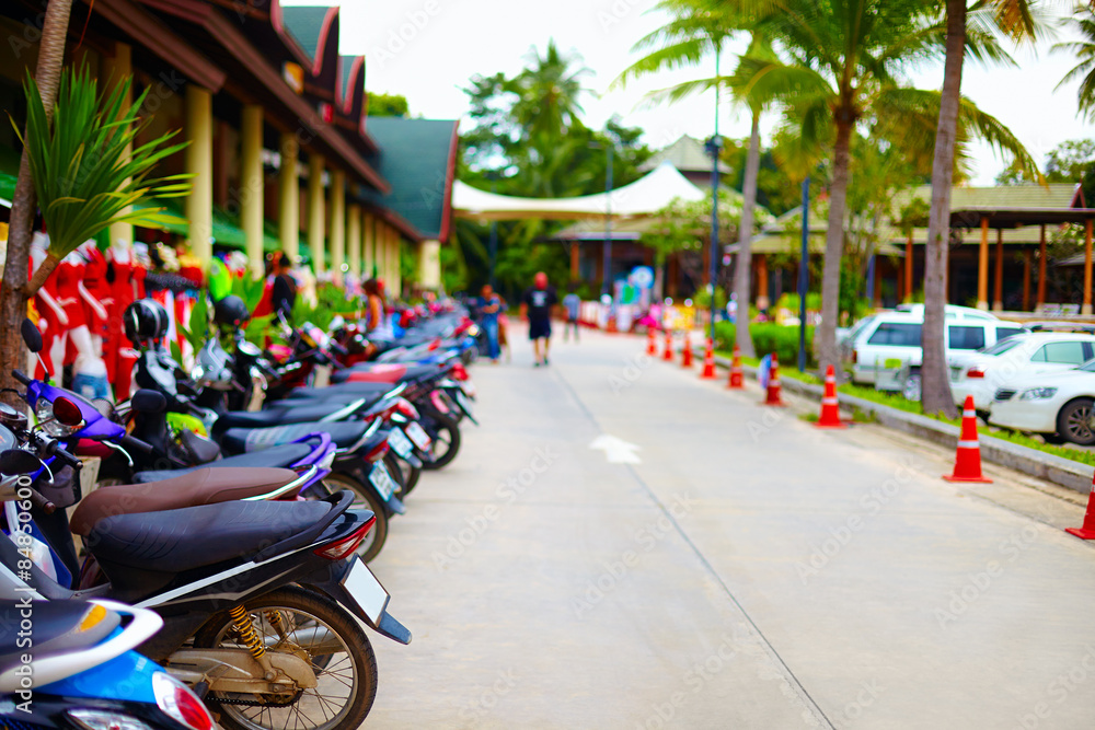 Fototapeta premium group of motorbikes parked in row in public area
