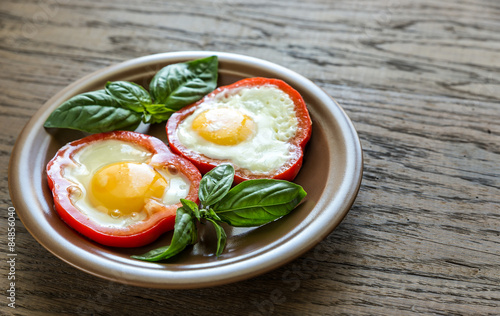 Fried eggs in bell pepper slices