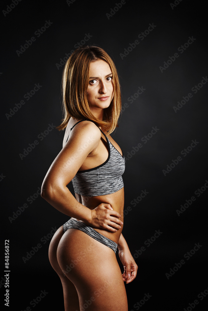 portrait of fitness girl with pretty buttocks with oil portrait of fitness girl with pretty buttocks with oil