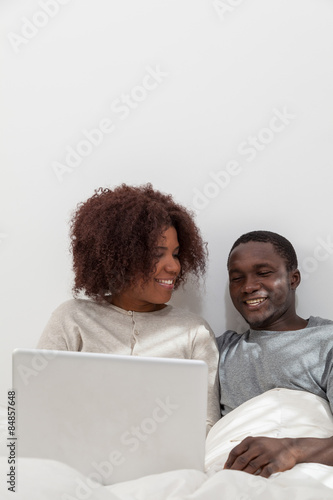 African couple using the computer