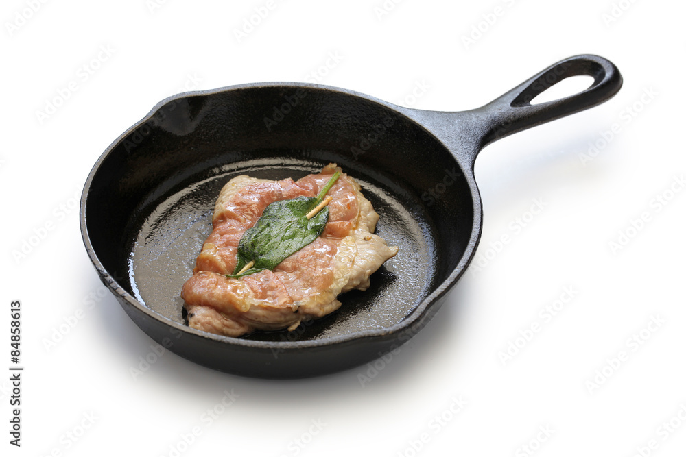 saltimbocca alla romana ( cooked veal, prosciutto and sage ) on skillet