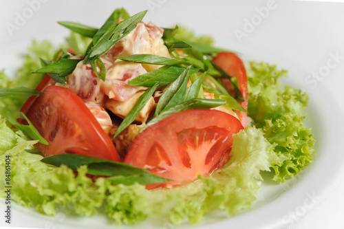 vegetable salad with tomatoes, lettuce, green onions and mushroo