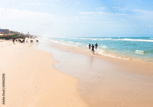 Runnging boiys in the sand