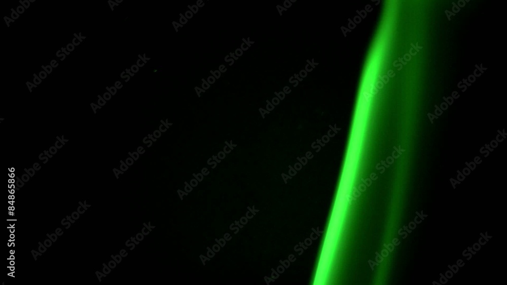 green smoke on a black background green smoke on a black background