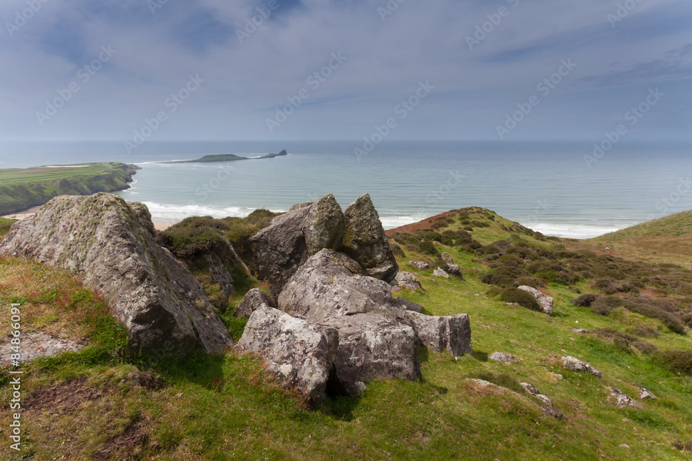 View of Worms Head and Rhossili Bay from the top of Rhossili Downs, Gower, Swansea.