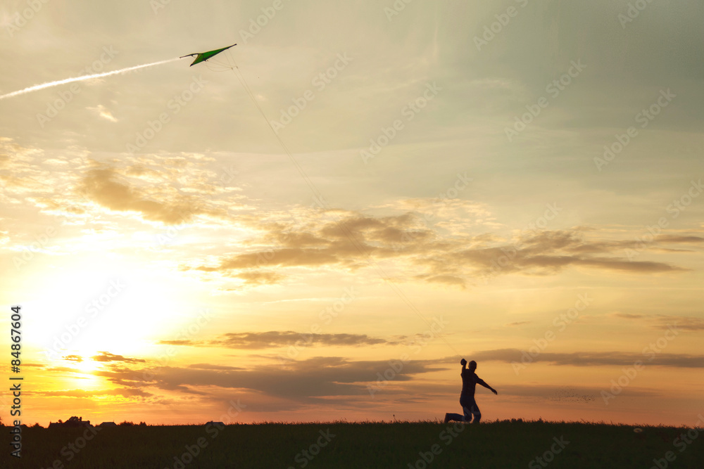 A man launches a kite
