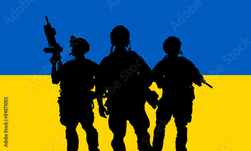 Silhouette of military soldier or officer with weapons against the Ukrainian flag
 background