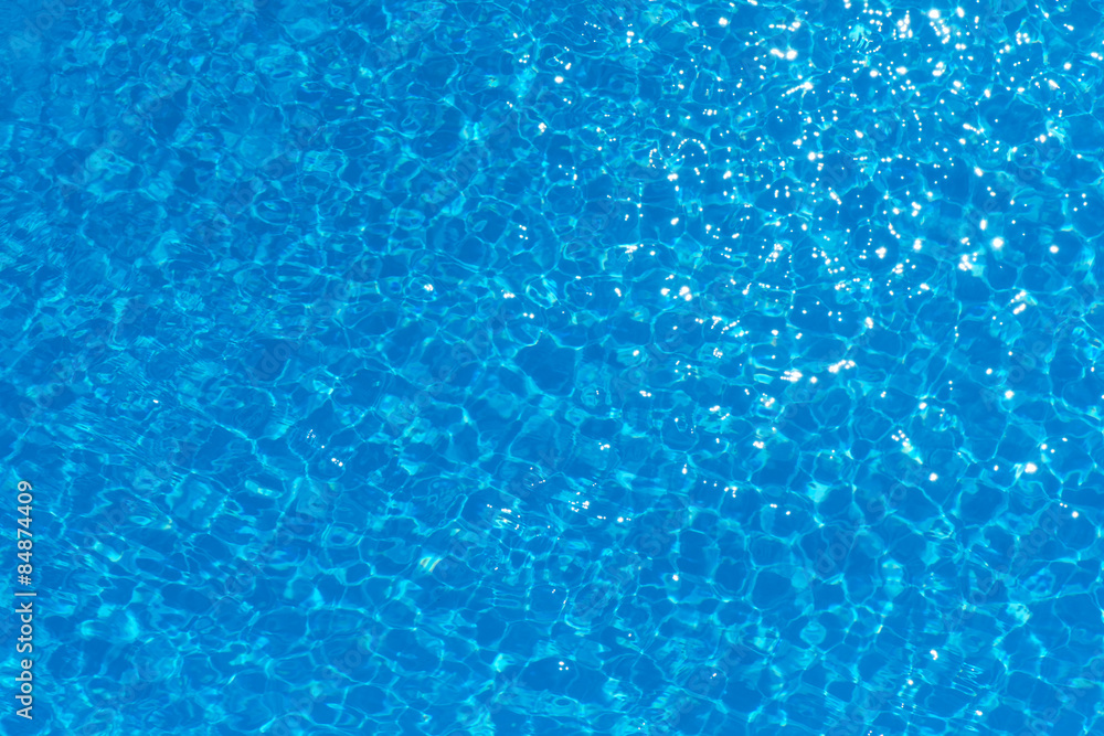 Blue and bright water surface in swimming pool