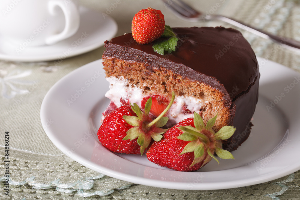 piece of chocolate cake with strawberries on a plate closeup
piece of chocolate cake with strawberries on a plate closeup