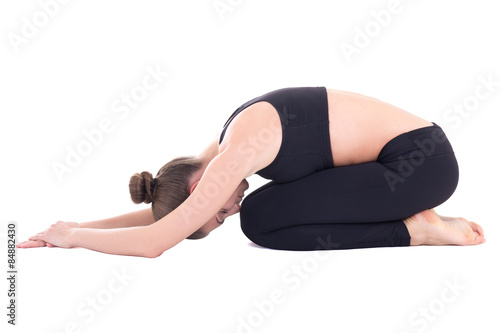 young beautiful woman in yoga pose "child" isolated on white