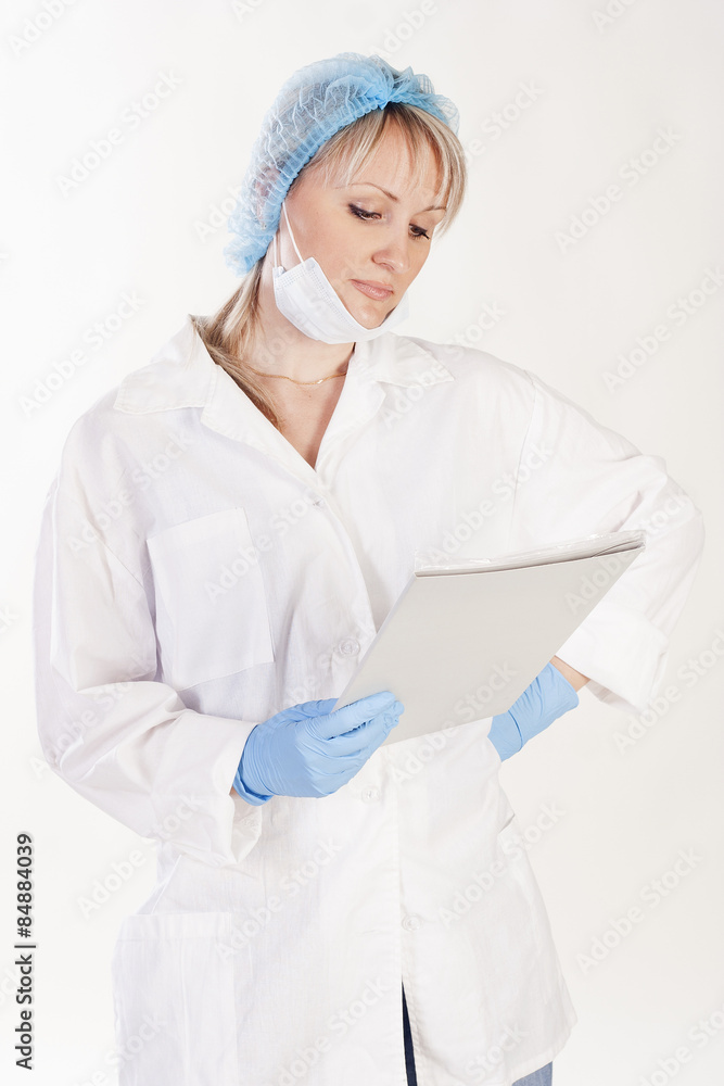 Fototapeta premium Pretty doctor with folder