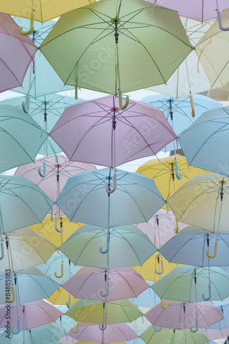 Many Umbrellas hanging in the sky