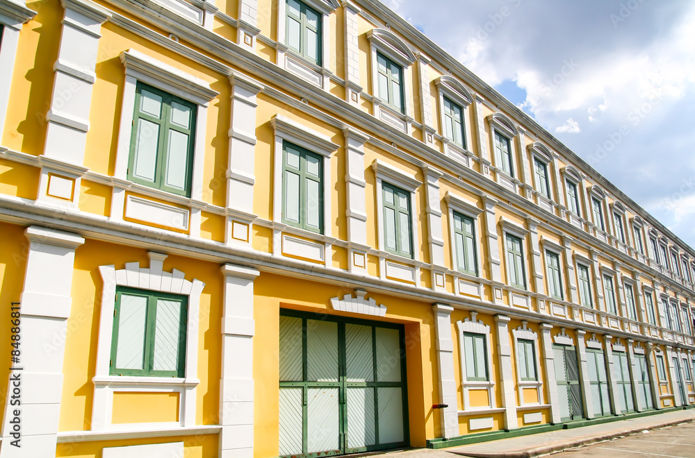 Yellow building with many windows