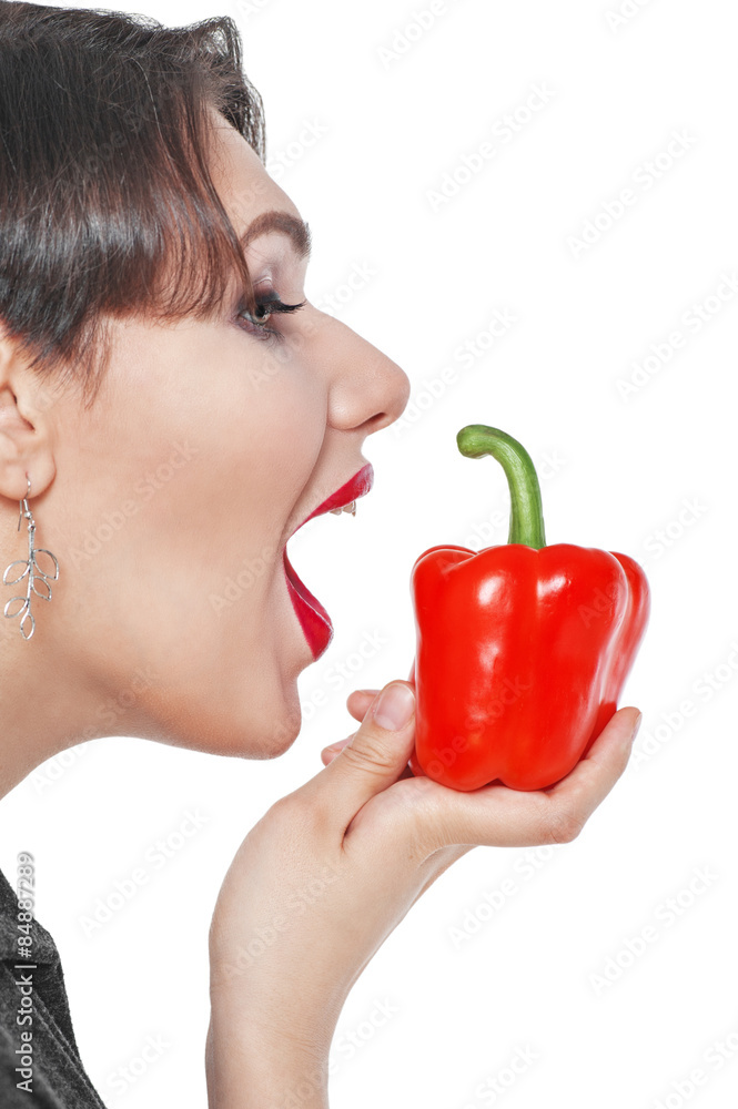 Beautiful plus size woman with red pepper isolated Beautiful plus size woman with red pepper isolated