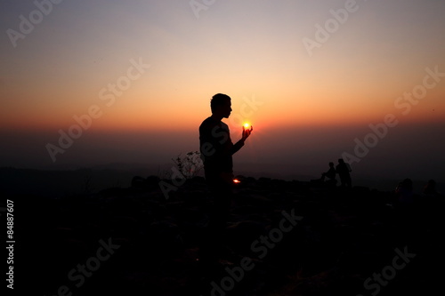 Man on top of mountain