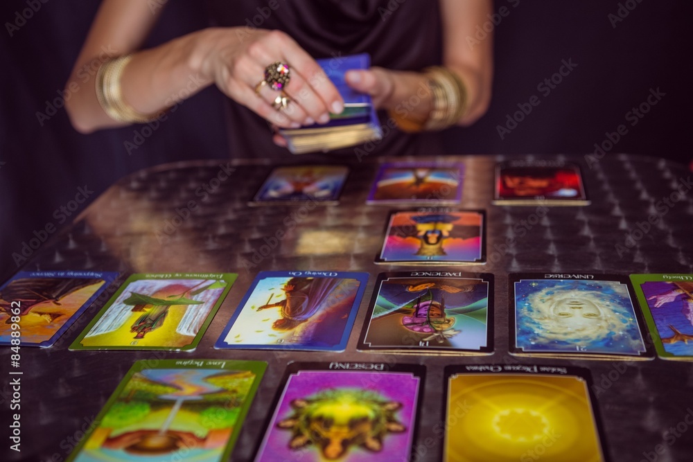 Fortune teller forecasting the future with tarot cards - obrazy, fototapety, plakaty 